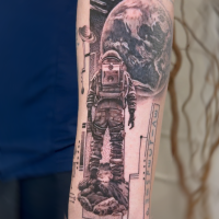 Lattuada-Tattoo_astrounault_forearm_realism